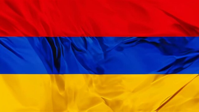 The national Armenia waving flag in background.