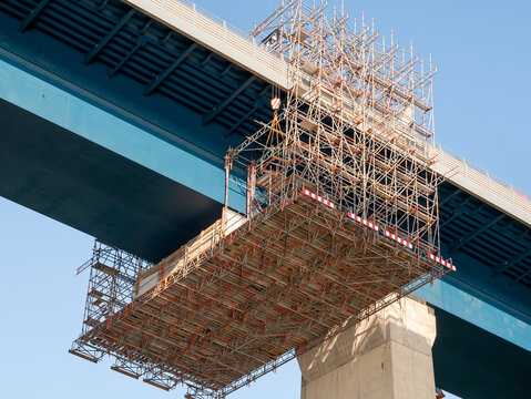 Scaffolding under bridge over Kiel Canal, Germany, for safety during maintenance and repair work