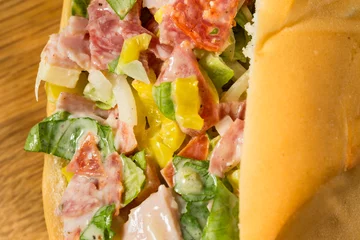 Tuinposter Trendy Homemade Chopped Italian Sub Sandwich © Brent Hofacker