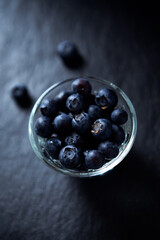 Bilberries on dark background. Close up