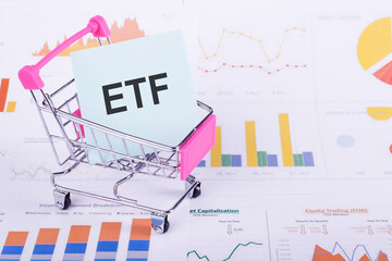 ETF - word on stickers and a paper, a bright solution for business, financial, marketing concept
