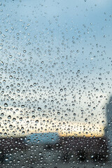 City window full of raindrops