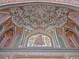 The highly Colorful and intricately painted Ganesh Pol Gate in Amber Fort ( Amer Fort ) Jaipur,...