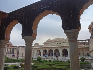 The Amber Palace features complex arches and building structure.