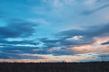 Obraz premium Dramatic sunset sky with clouds.