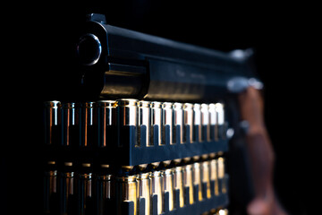 Elegant Semiautomatic 9mm Handgun Leaning on Bullet Ammunition in Switzerland. - obrazy, fototapety, plakaty