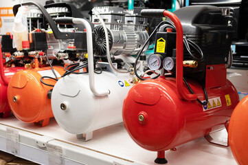 The compressor is oil-free in red and white colors.