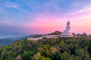 Fototapeta na wymiar Statue big Buddha in Phuket on sunset sky, aerial top view. Concept travel Thailand landmark