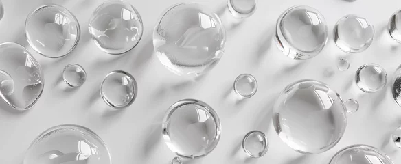 Foto op Plexiglas Clean transparent water drops on a white background. © Valeriy