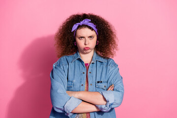 Photo of moody unhappy lady dressed denim outfit arms folded looking you isolated pink color...