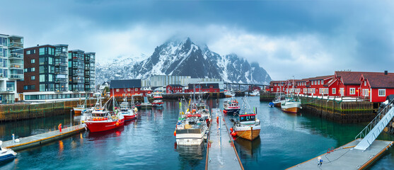 Panoramic view of the waterfront harbour and fishing boats by day in the beautiful fishing town of Svolvaer, the largest city and administrative centre of the Lofoten Islands in Northern Norway