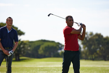 Friends, men and sport with golf swing for driver training on grass or lawn for recreation at...