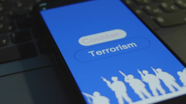 Counterterrorism inscription on smartphone screen with blue background. Graphic presentation with silhouettes of soldiers with guns. Military concept