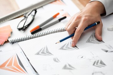Graphic Designer Drawing Sketches Logo Design - 1