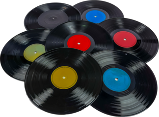 Assorted vinyl records with colorful labels cut out on transparent background
