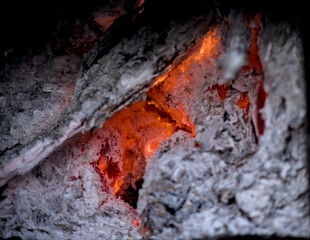 Cozy campfire embers glowing warmly