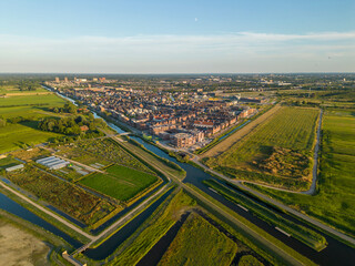 Aerial view of cityscape of Amersfoort, the Netherlands against blue sky.
