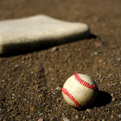 Baseball Field Home Plate with Ball and Textured Dirt of Balldiamond Diamond - obrazy, fototapety, plakaty