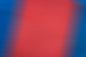 Blue-red blurred abstract background on the theme of martial arts, a background for text or photos.