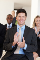 Manager, clapping and audience for success at workshop, professional conference or onboarding...