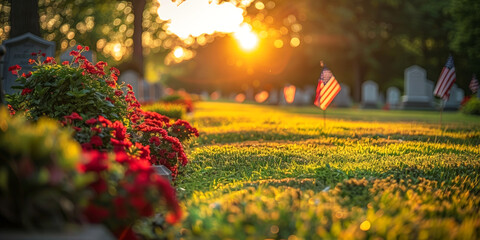 Golden hour at cemetery adorned with flowers and American flags, conveys remembrance and honor. - obrazy, fototapety, plakaty