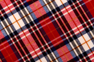 Texture of red checkered fabric. Checkered cotton background