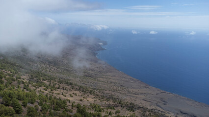 Fototapeta na wymiar El Hierro mountain with sea and clouds