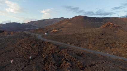road between volcanic land from drone in mountain of El Hierro island, Canary Islands