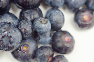 A bunch of blueberries are shown in a close up - 776210684