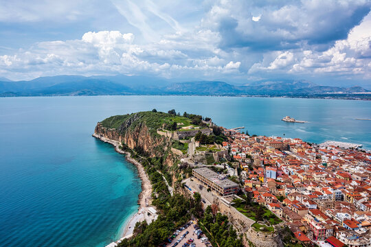 View from Palamidi on Nafplio city in Greece with port, Bourtzi fortress, and blue Mediterranean sea