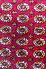 Traditional red rug at the Khan palace in Khiva.