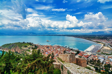 View from Palamidi on Nafplio city in Greece with port, Bourtzi fortress, and blue Mediterranean sea