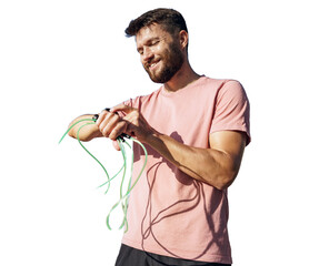 A male trainer uses a cardio fitness watch, workout warm-up in sportswear. Isolated background.