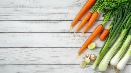 White wooden background with fresh vegetables, carrots and green leeks on the side and space for text, flat lay, top view. - Powered by Adobe
