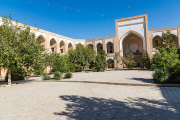 Courtyard at the Kukaldosh Madrasa in Bukhara. - 776226878
