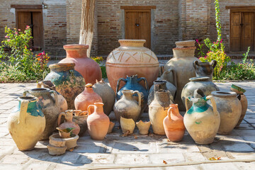 Variety of pots in a courtyard in Bukhara.
