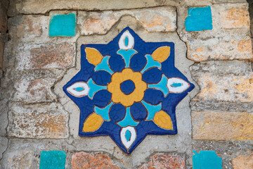 Decorative tile on the Gur-i Amir Mausoleum in Samarkand. - 776234297
