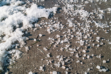Rock salt on pavement - 776239684