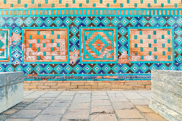 Decorative tile work at the Ustad Ali Nasafi Mausoleum at the Shah-i-Zinda in Samarkand. - 776241652