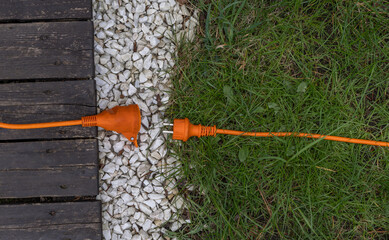 Electric extension cord and power connection in the garden