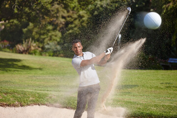 Man, golf ball and swing with sand for sports, action and energy with club for game, competition...