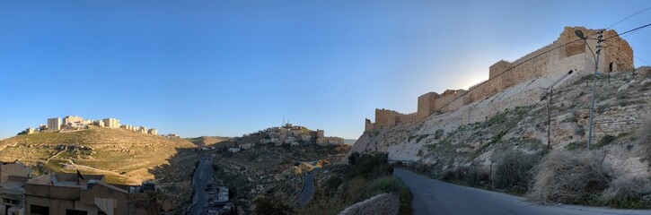 Fototapeta na wymiar Medieval Crusaders Castle in Al Karak - Jordan, Al Kerak fortrest in arab world served as a fort for many centuries, historical ruins on a mountain above the city