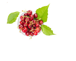 cherries in a bowl isolaetd with leaf
