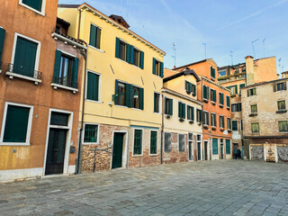 View from the streets and water canal in Venice, Italy. Old historic architecture