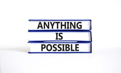 Anything is possible symbol. Concept words Anything is possible on beautiful books. Beautiful white table white background. Business anything is possible concept. Copy space.