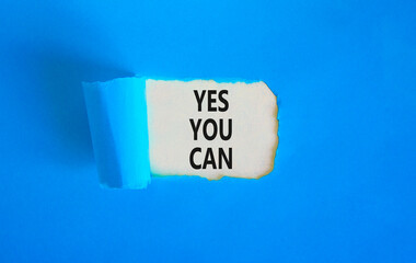 Motivational and Yes you can symbol. Concept words Yes you can on beautiful white paper. Beautiful blue paper background. Business motivational and Yes you can concept. Copy space.
