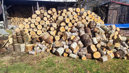 Pile of chopped firewood.Stack of firewood.A large pile of firewood