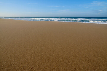 sand beach with waves