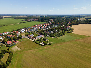 Fototapeta na wymiar Aerial view of agricultural field in the village of Thyrow Brandenburg Germany