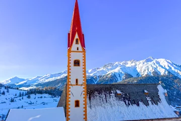 Fotobehang Pfarrkirche Nauders - Tirol (Österreich) © Ilhan Balta
